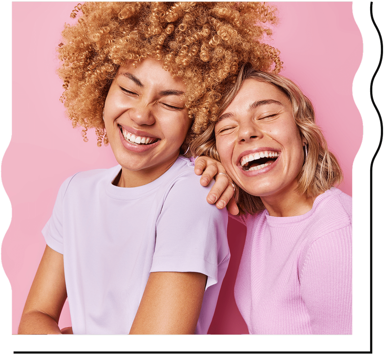 Two women laughing set on a pink background