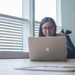 woman looking at computer