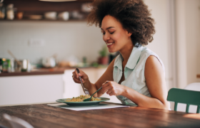 woman eating pasta