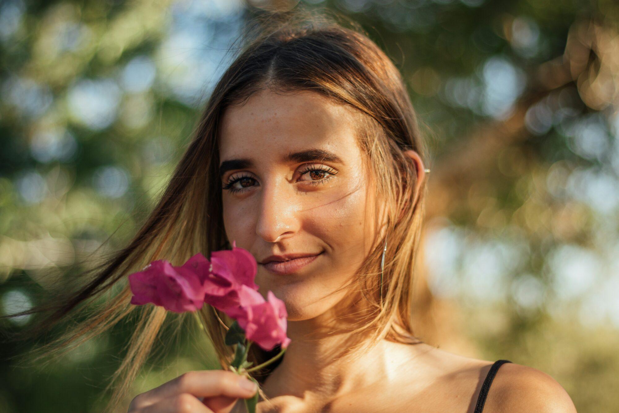 woman holding flower